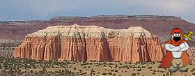 280px-Entrada_Sandstone_capped_by_Curtis_Formation_in_Cathedral_Valley.jpg