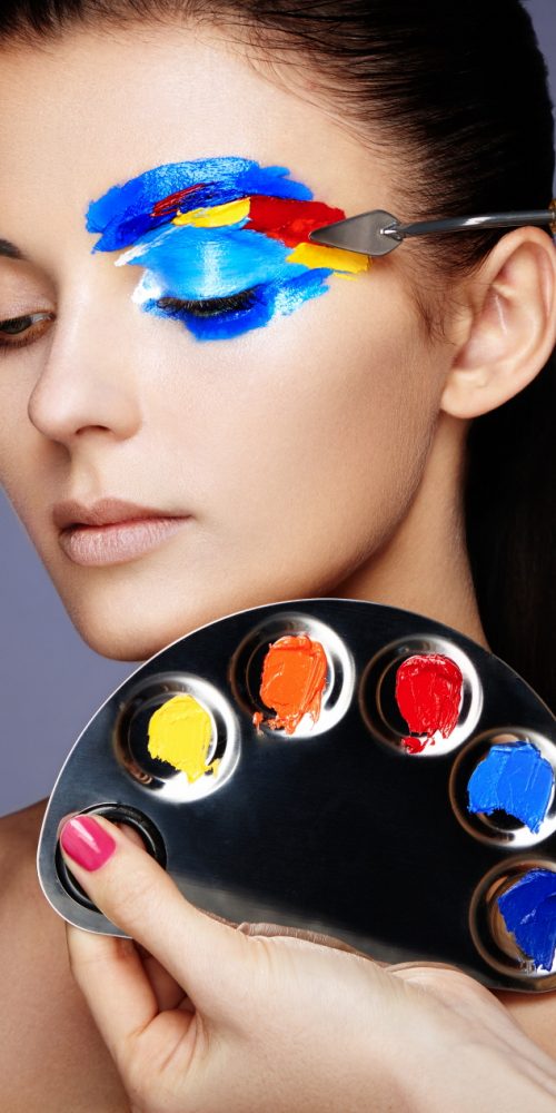 makeup-artist-applies-colorful-makeup-PSJG8EE-500x1000.jpg