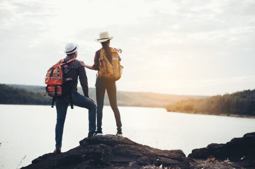 couple-tourists-with-backpacks-mountain-1024x683.jpg