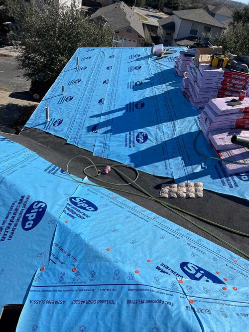 shingle-roofers-at-work.jpg