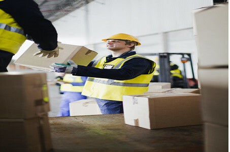 workers-unloading-boxes-from-truck.jpg