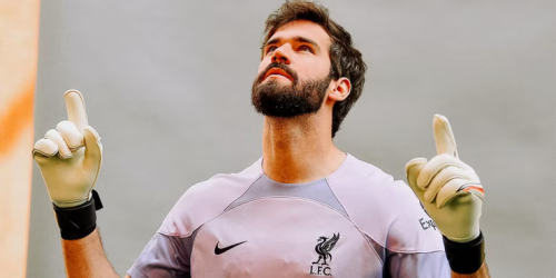 Alisson pointing up
