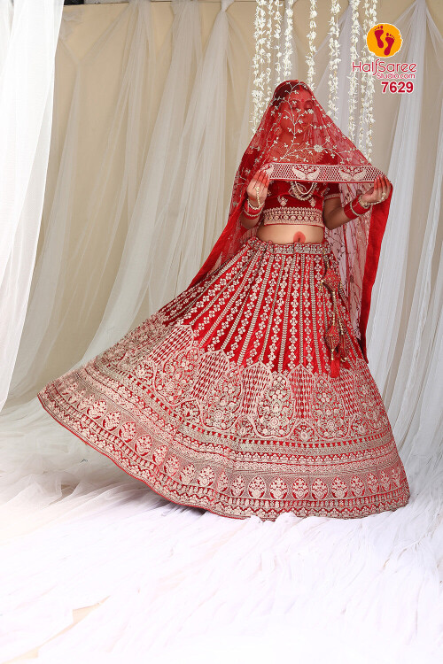 Embroidered lehenga » is a traditional Indian attire worn by women. It is a three-piece outfit that includes a long skirt, a blouse, and a dupatta. The Embroidered lehenga comes in various designs, fabrics, and colors, ranging from simple and elegant to heavily embellished and embroidered. It is a popular choice for weddings, festivals, and other formal occasions. The Embroidered lehenga is comfortable to wear and can be accessorized with jewelry and high heels to complete the look. It is a versatile outfit that can be customized to suit individual preferences and styles.
https://halfsareestudio.com/collections/bridal-lehenga