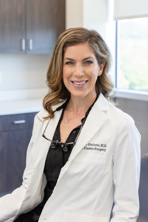 DrGuthriePhotoSmilingInLabcoat.copy-1920w.jpg