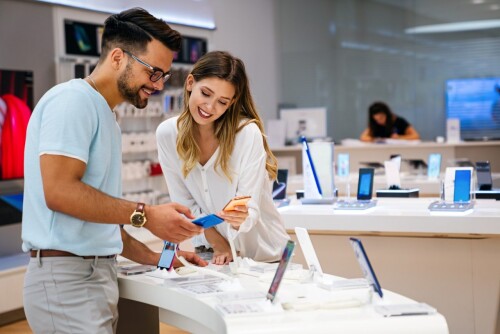 shopping-a-new-digital-device-happy-couple-buying-a-smartphone-in-store.jpg