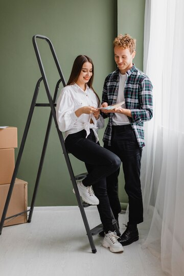 couple making plans to redecorate their house